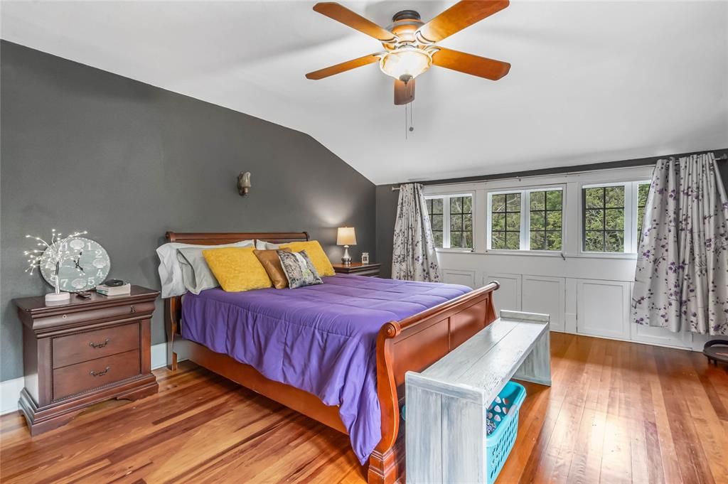 Primary bedroom with original built-in under window storage