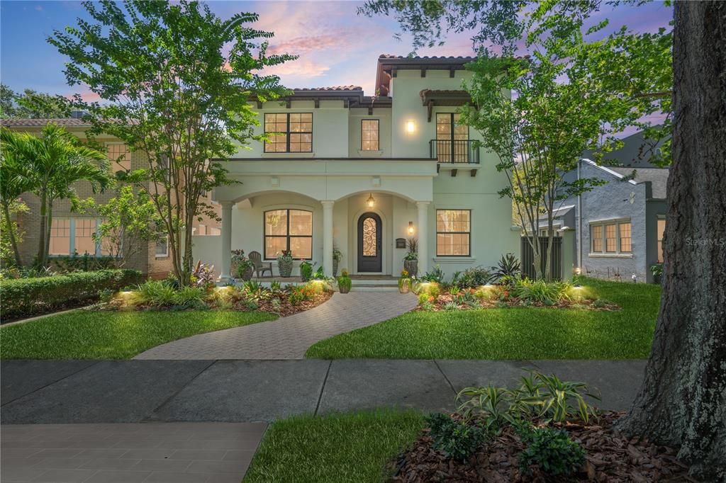 Stunning Mediterranean semi-custom home built in 2018. The exterior construction is entirely concrete block with stucco.