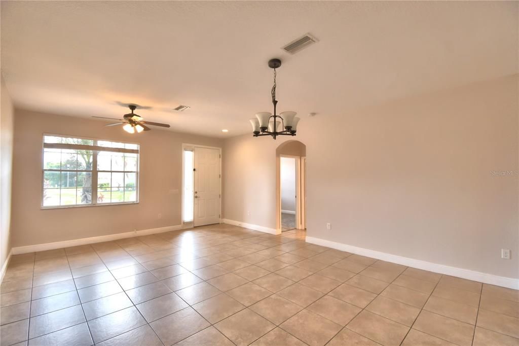 View across Dining area and formal living toward Front Door