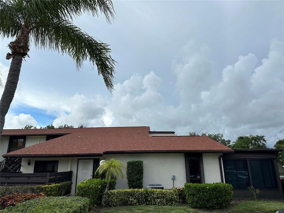 Front entrance with private courtyard on left and bonus room on the right