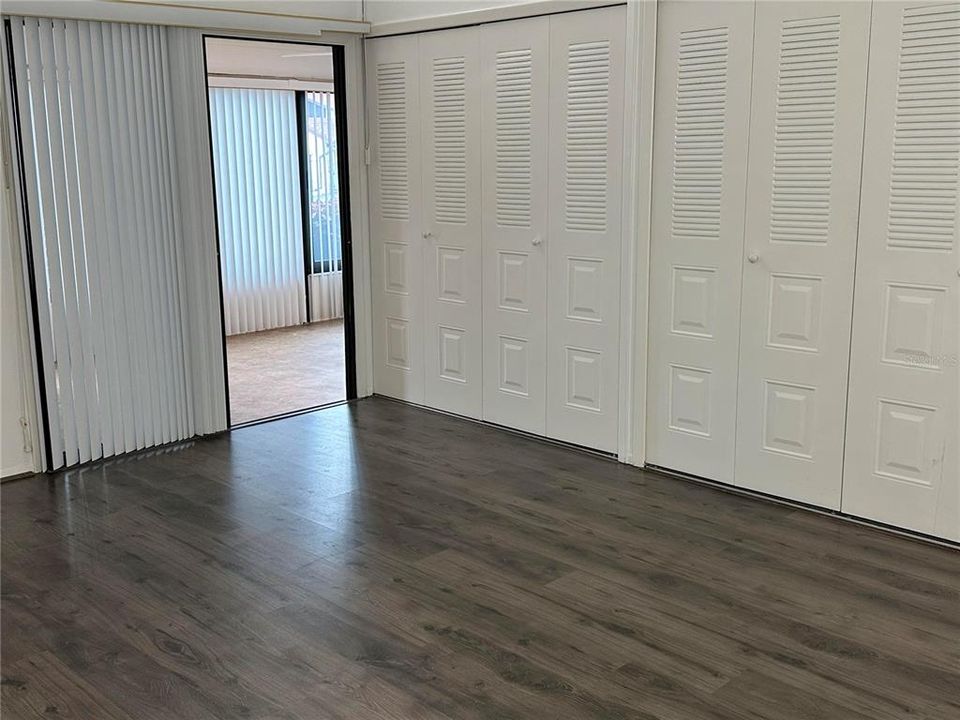 Primary bedroom with wall to wall closets