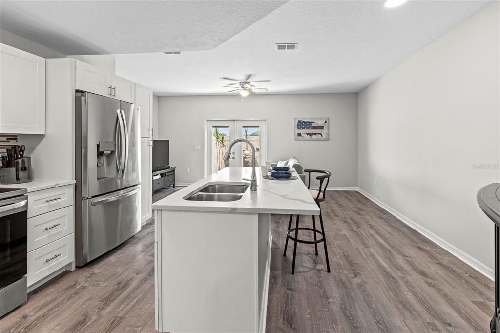 Large kitchen island with plenty of space for barstools