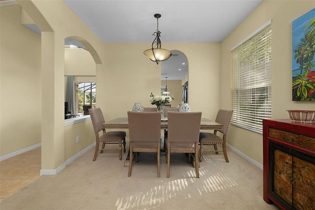 Arched entry to dining room / living room combination