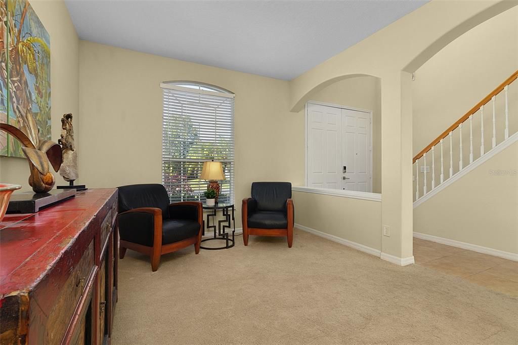 Living Room and view of stairs to 2nd floor