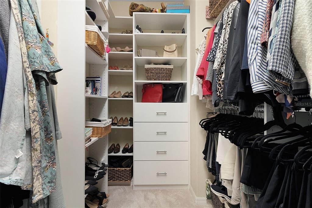 Closet by Design installed walk in closet shelves, drawers.