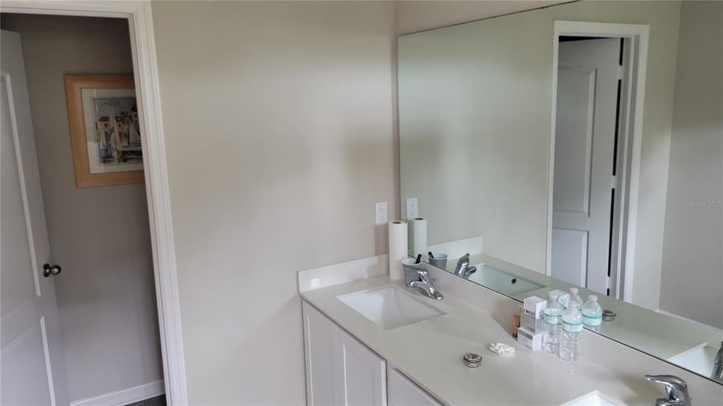 mbr bathroom with double sinks