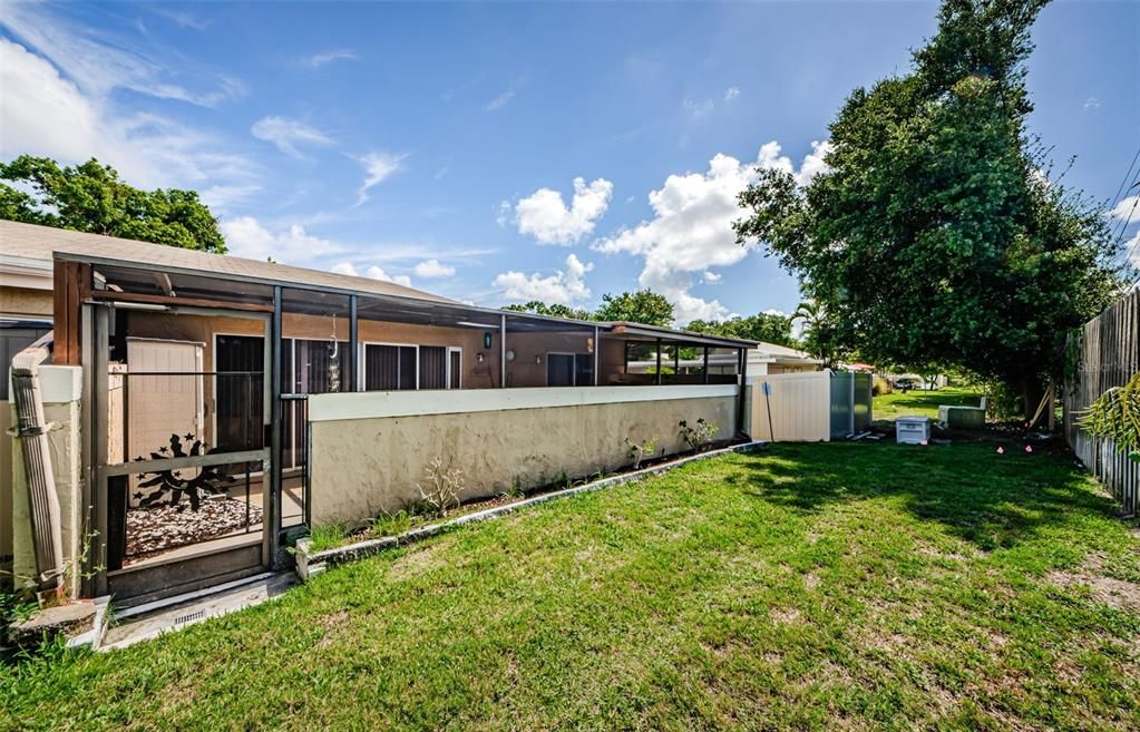 Back of villa looking at 29 x 8 screen and covered lanai