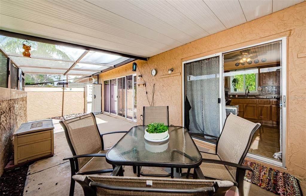 Florida living at its best! Lanai is 29 x 8 is enclosed, part of it is covered and the other part is screened.