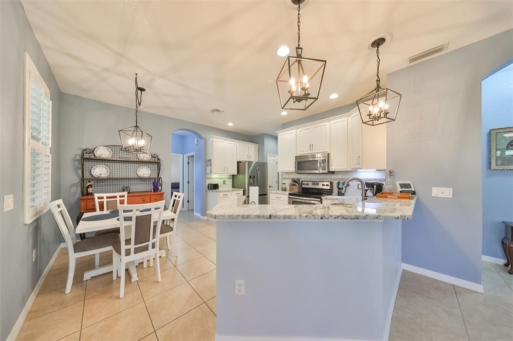 Kitchen to Eating Area to 2nd Bedroom