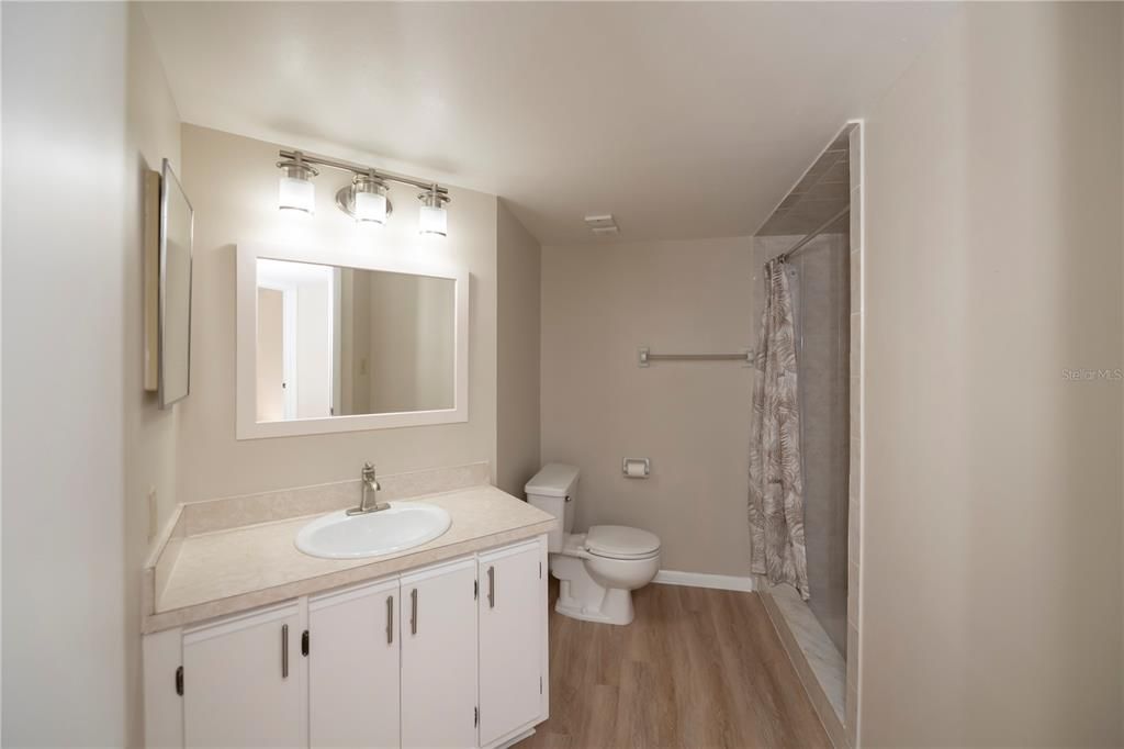 Second Bath W/Newer Vanity, Mirror, & Plumbing Fixtures