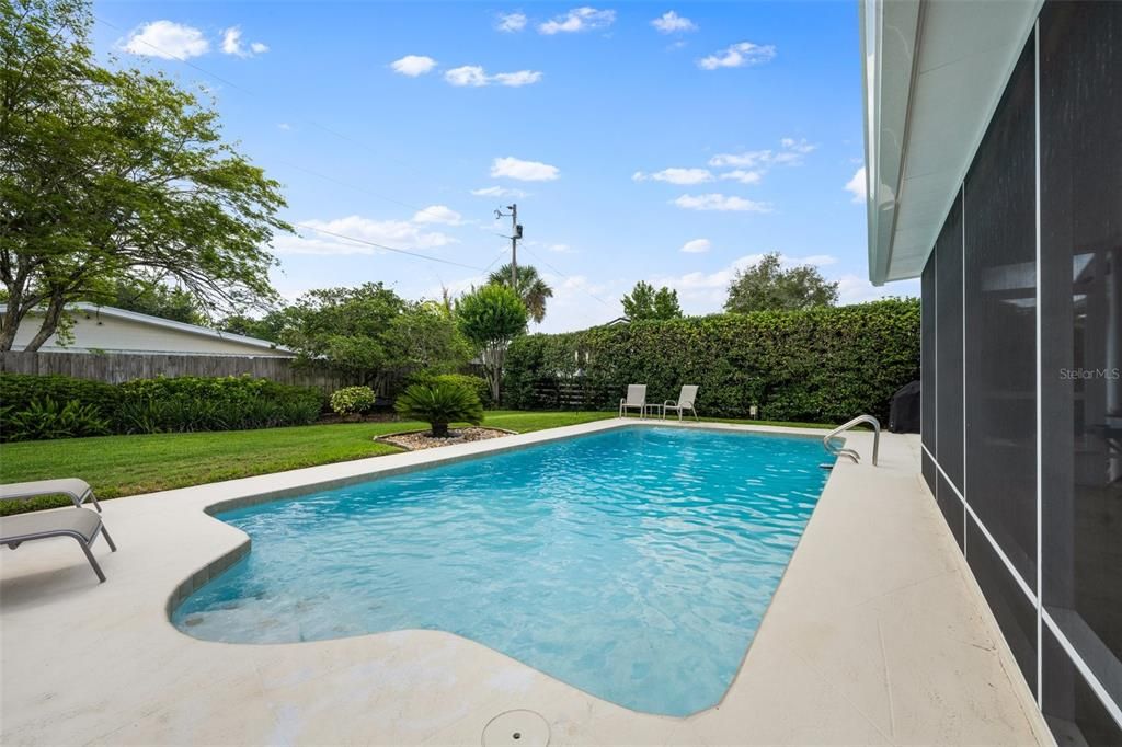 Sparkling Pool and Lush Landscaping