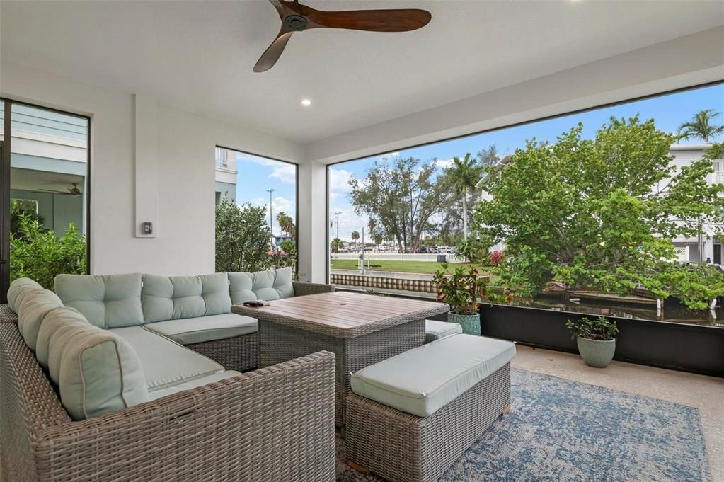 Ground level screened patio overlooking the peaceful canal