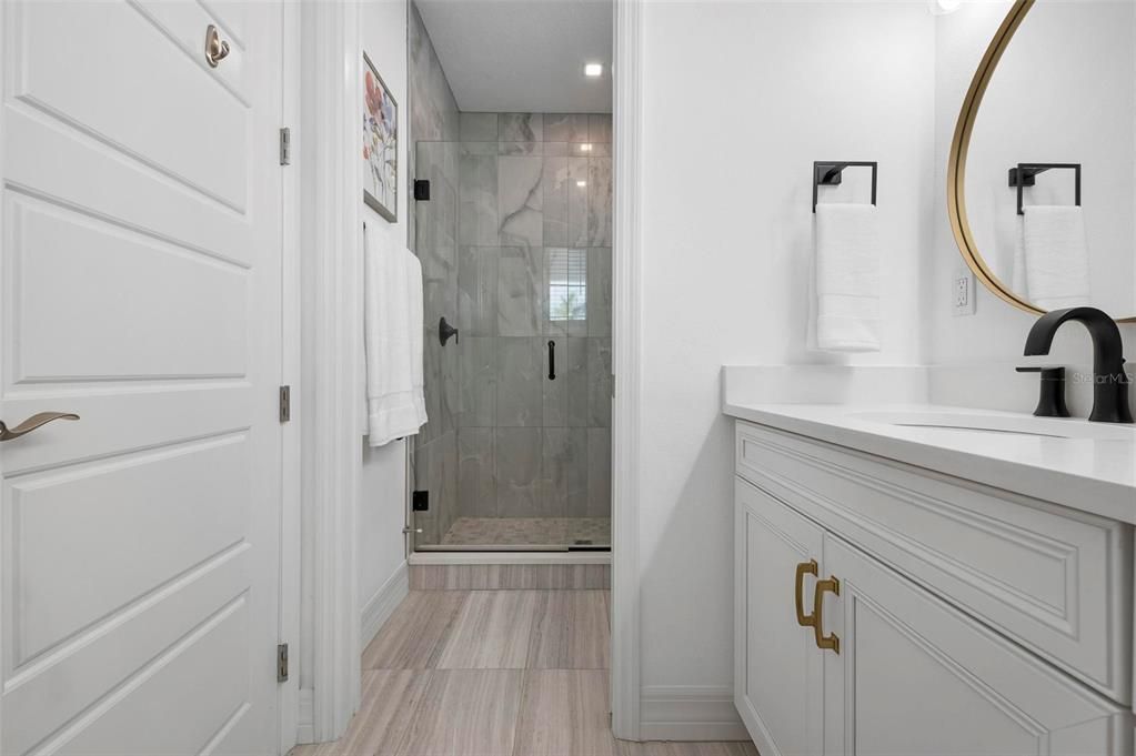 Primary bath with dual vanities and walk in shower