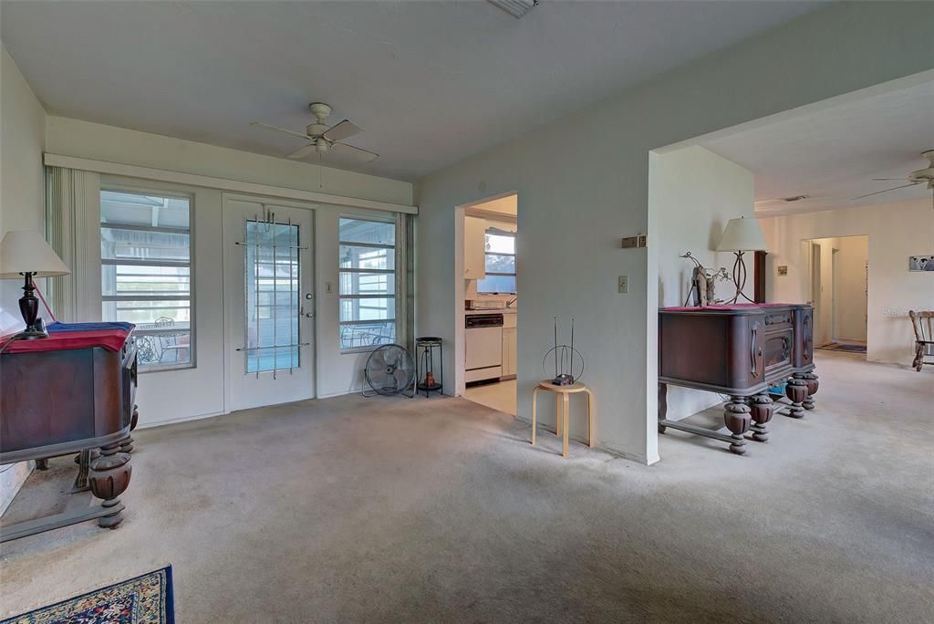 Notice the door from the dining room to the lanai and the entranceway to the kitchen.