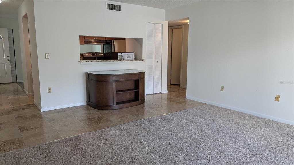 Living Room with pass through window to Kitchen