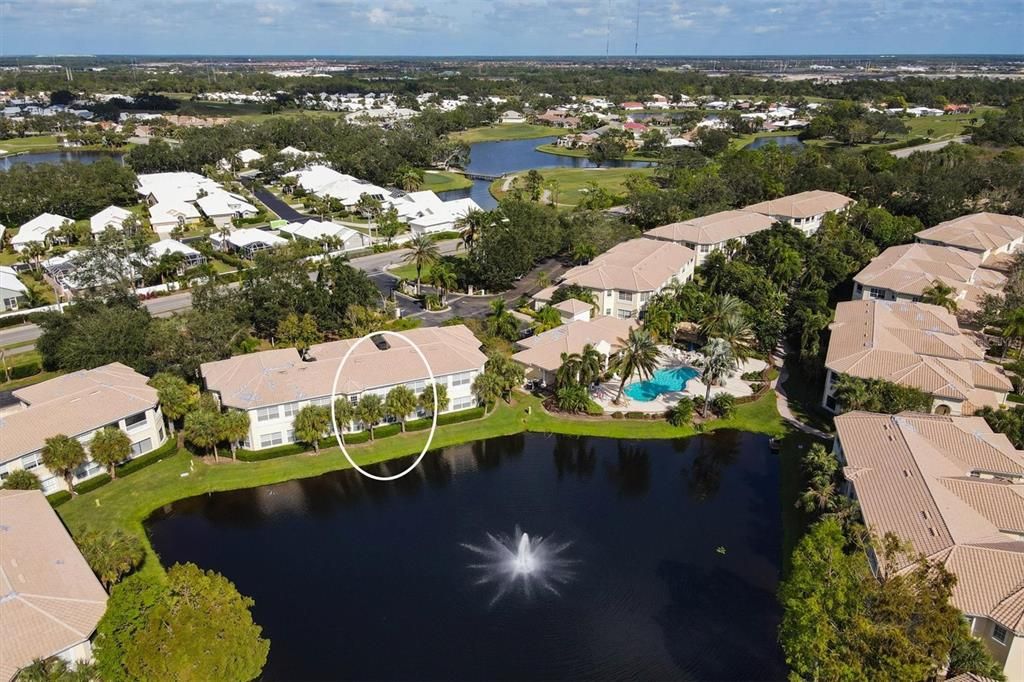 Drone view of pool with fountain view from LR