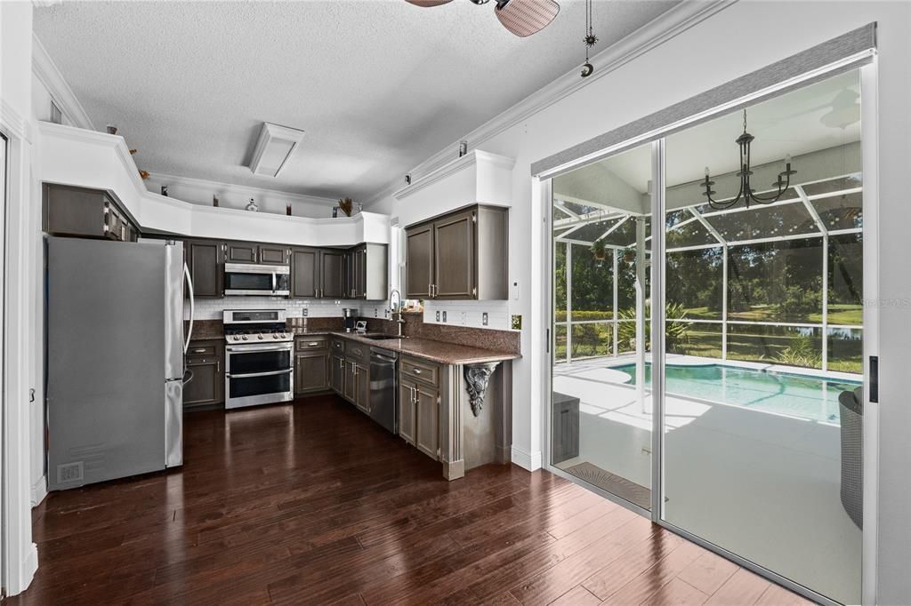 Sunshine filled Kitchen and Living Room combo