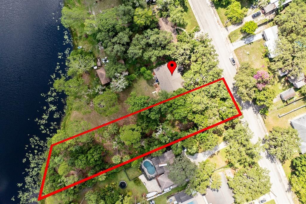 75 feet of lake frontage, almost 3/4 acre. Subject property is outlined in red.