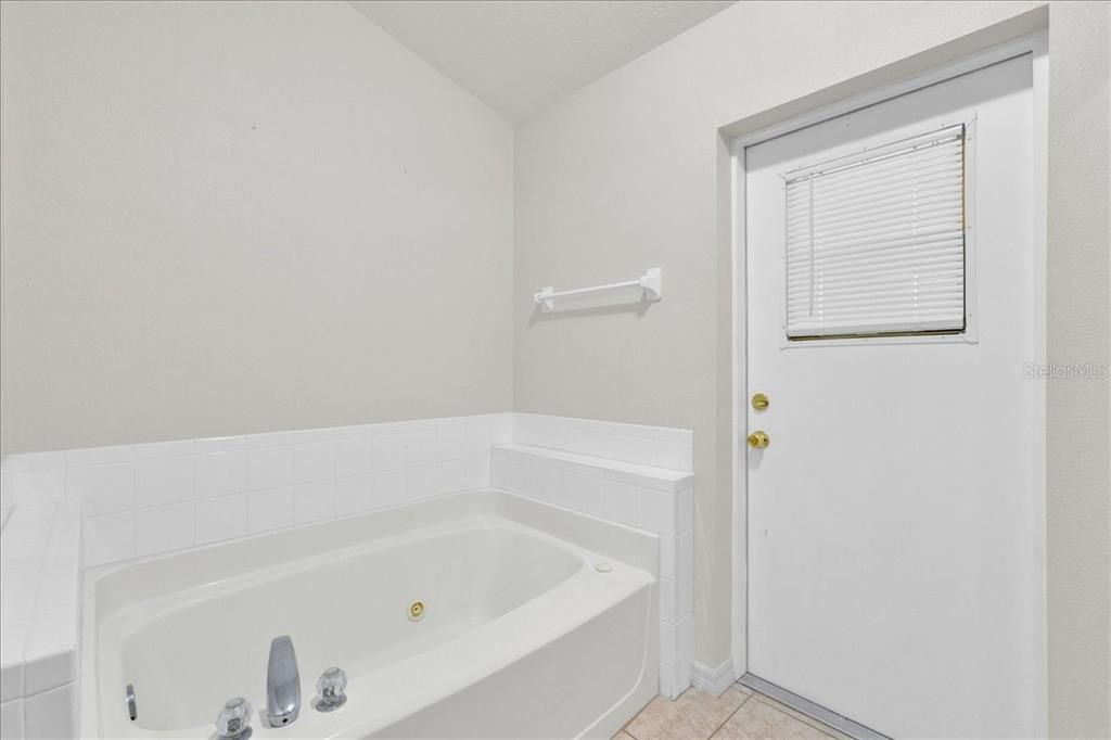 Master Bathroom w/access to the pool area