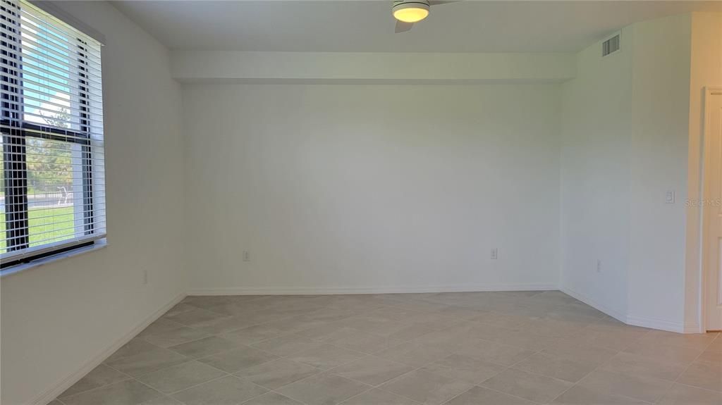 primary bedroom with dual windows