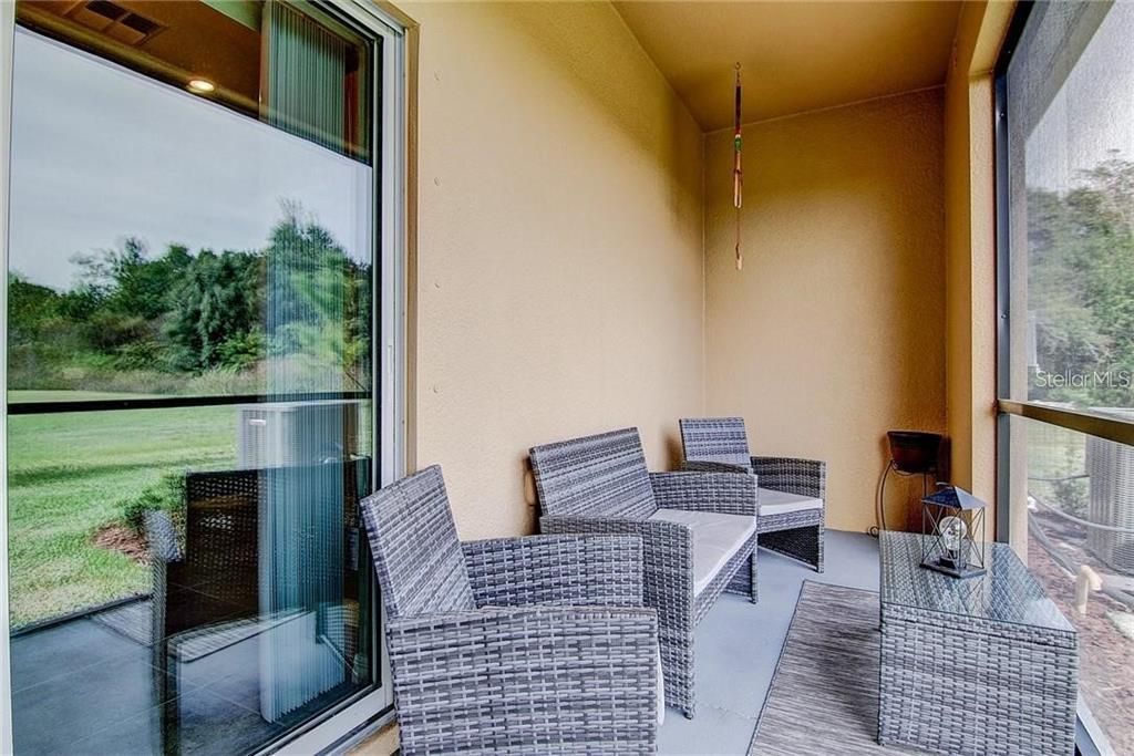 Enclosed Covered Lanai facing Pond