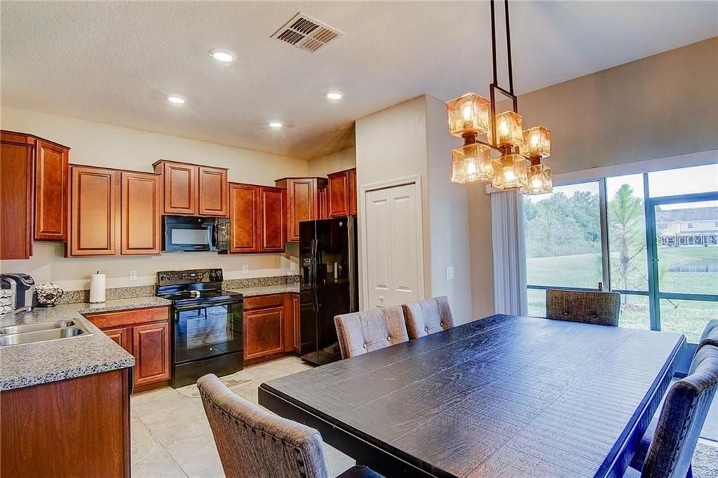 Kitchen with Dining with Custom Chandelier