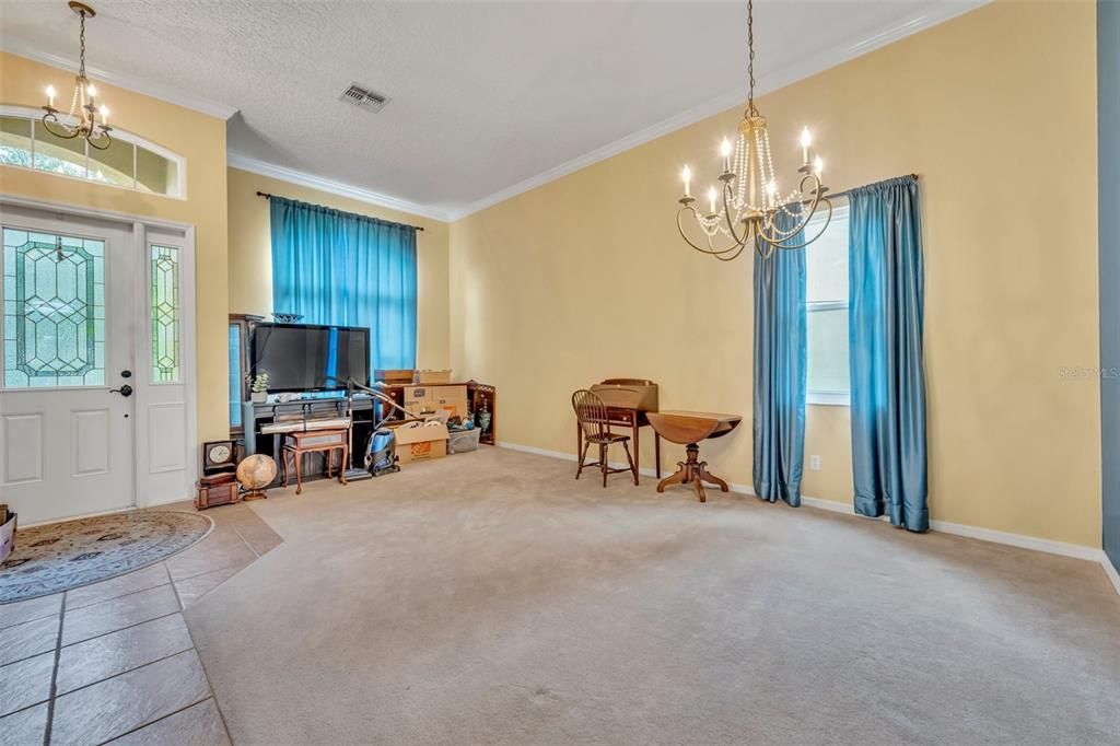 Formal living room.  Sellers are in the process of moving.  Thank you for you understanding
