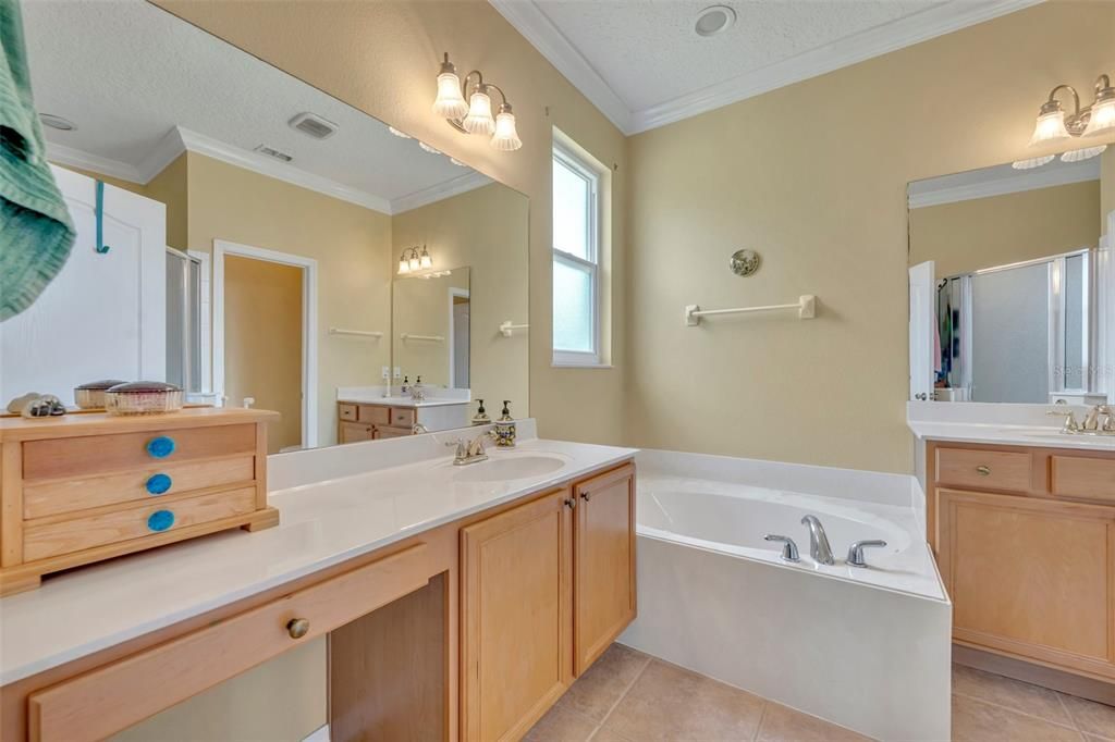 Owners bathroom with private water closet, walk-in shower and soaking tub