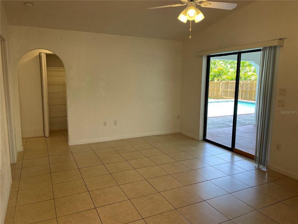 Family room with sliders to patio/pool