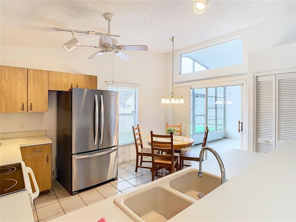 Kitchen from breakfast bar, view toward lanai