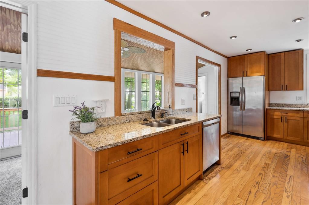 Kitchen with granite countertops and stainless appliances