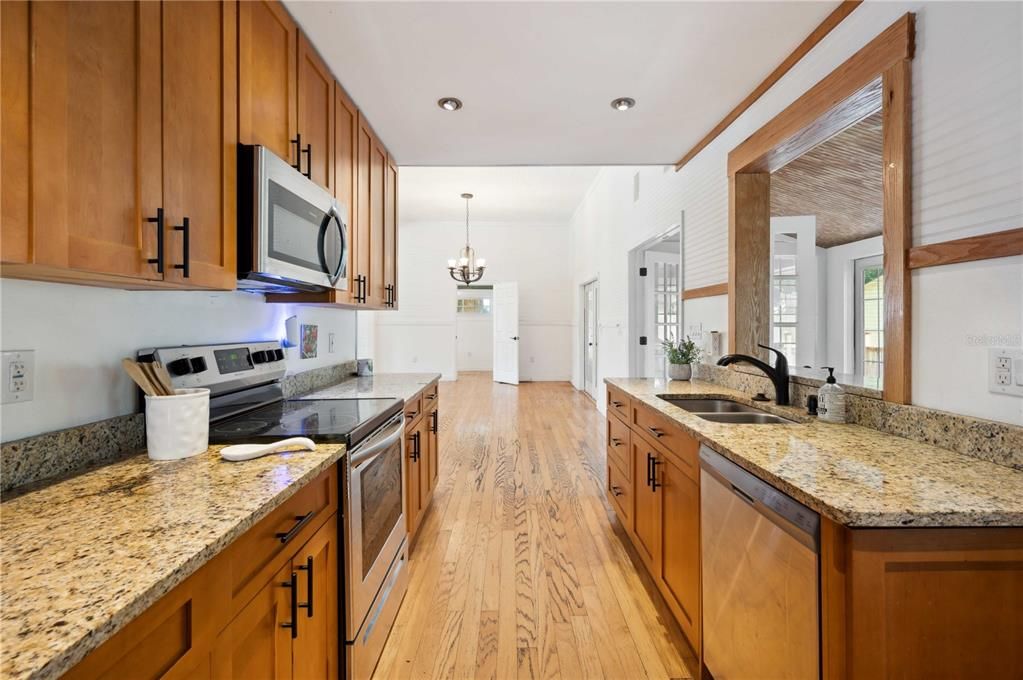 Kitchen with granite countertops and stainless appliances