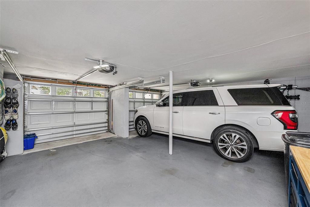 Impact resistant garage doors, room to park oversized vehicle