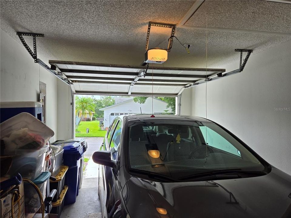 One car garage with automatic door opener