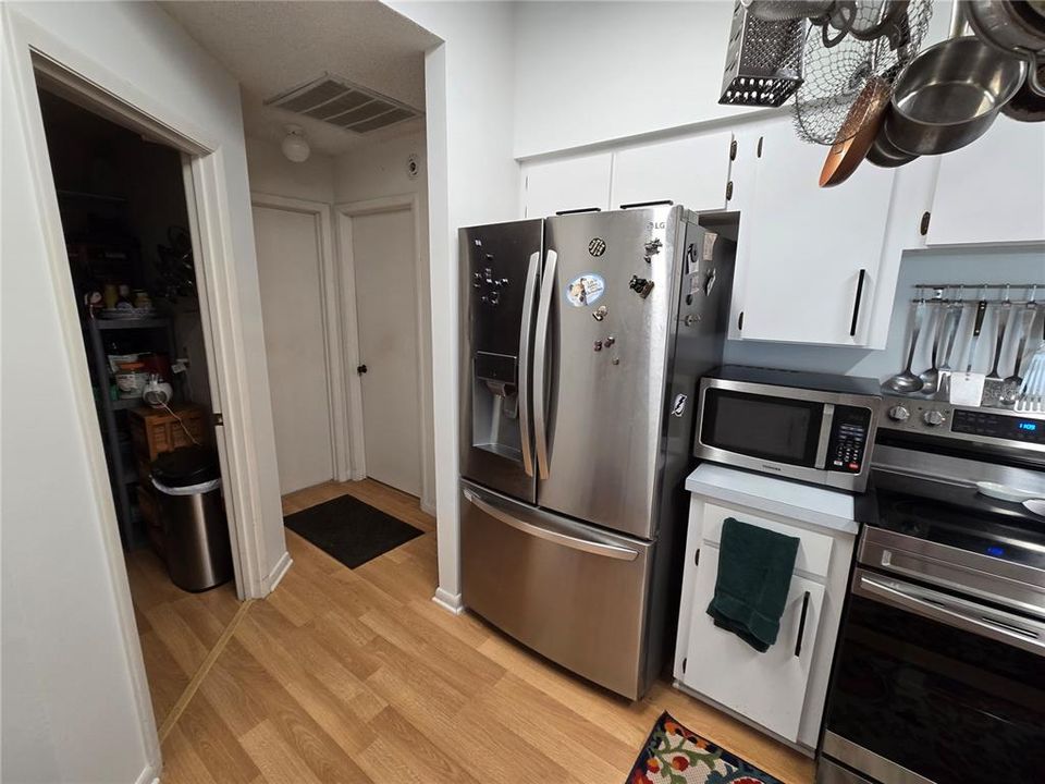 Kitchen to pantry and guest bedroom/bath