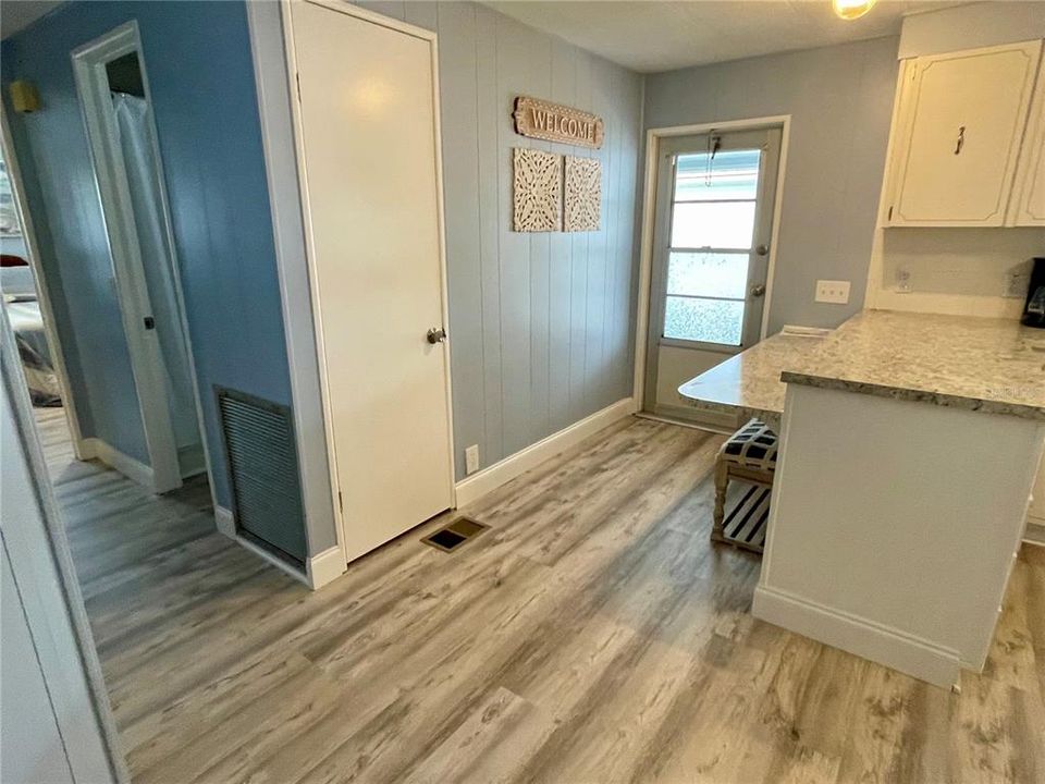 Side entry from the Lanai, Closet is the pantry, and behind that is the hall bath!