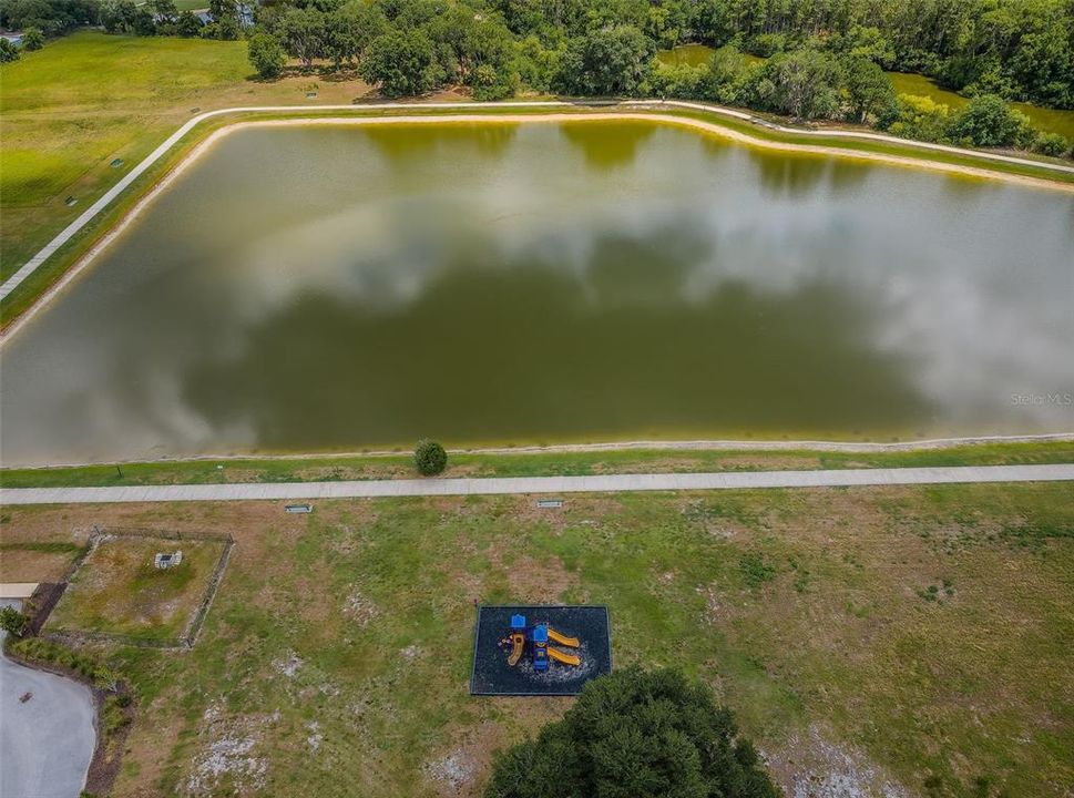 Trinity Communities  Master park pond walkway