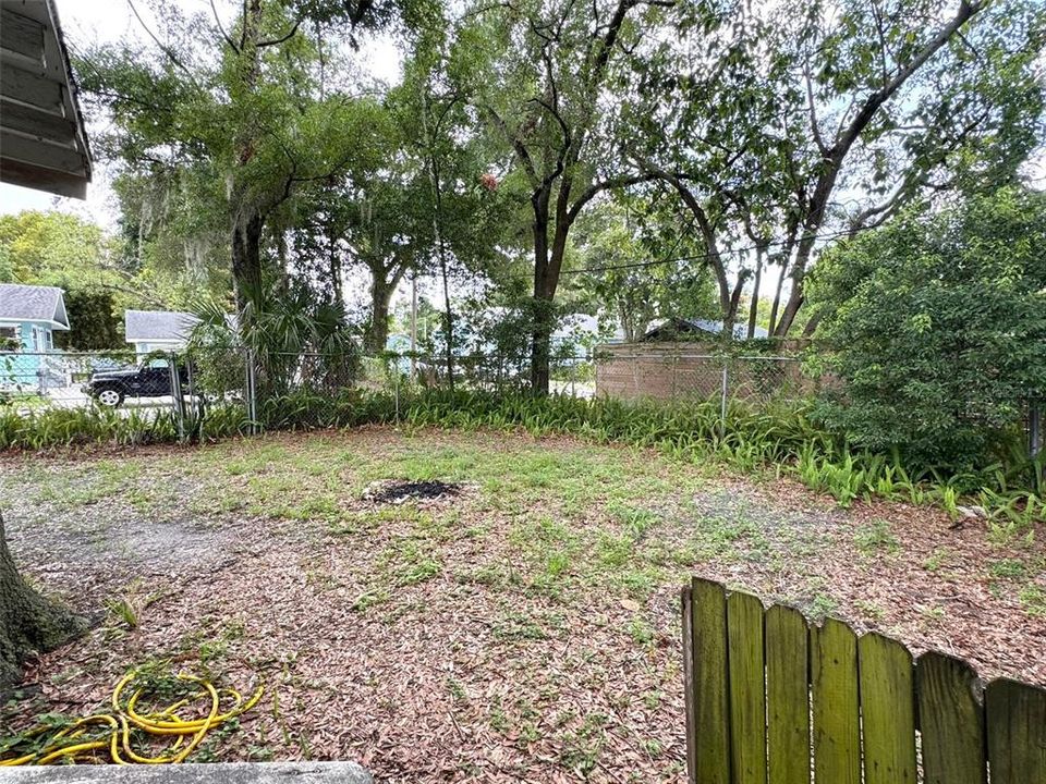 Large back yard with private alley