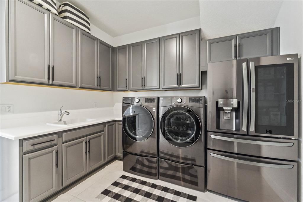 Expansive Laundry Room w/ Additional Refrigerator