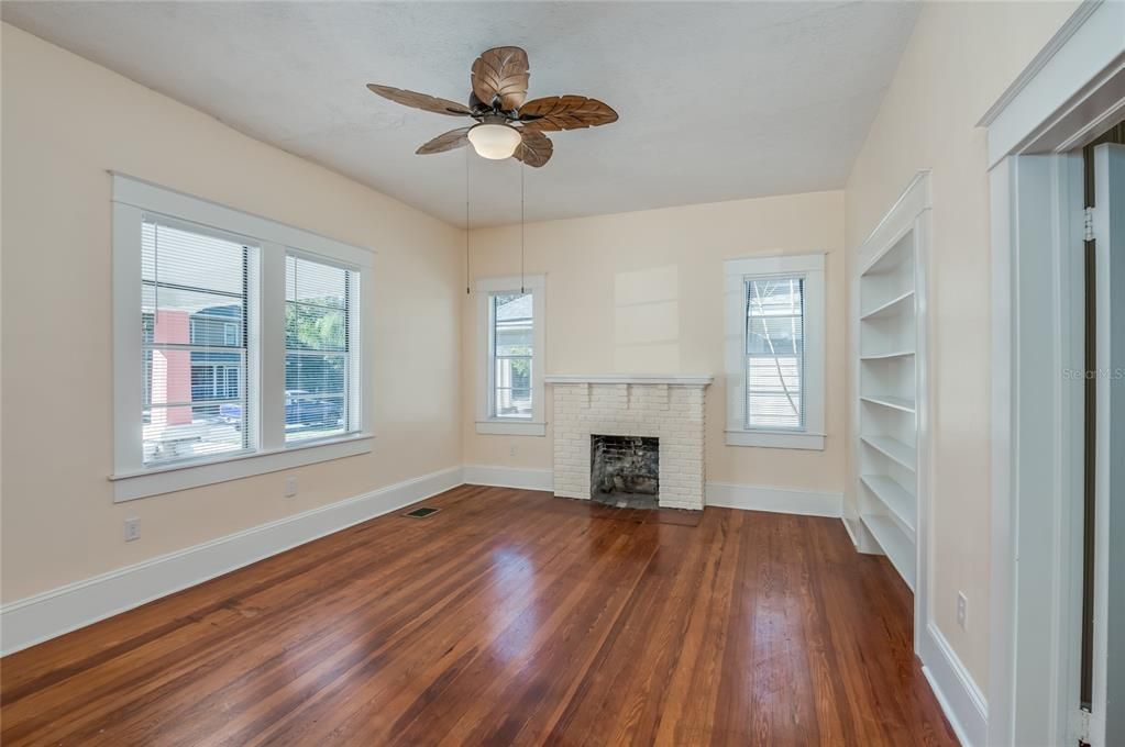 Living room with decorative fireplace