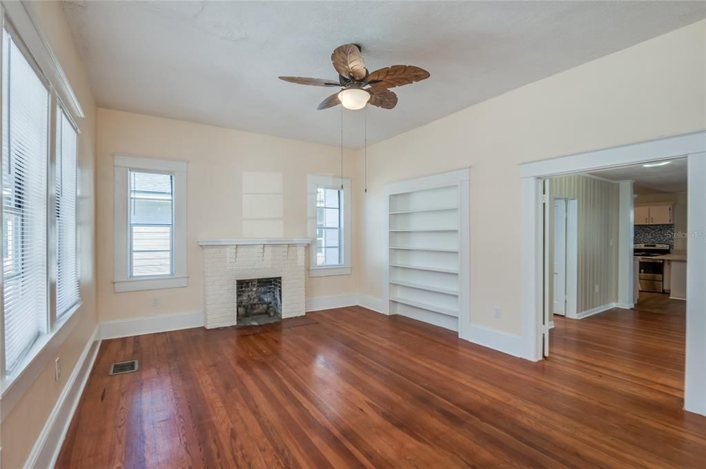 Living room with decorative fireplace