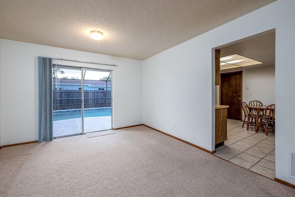 Dining area and view into kitchen