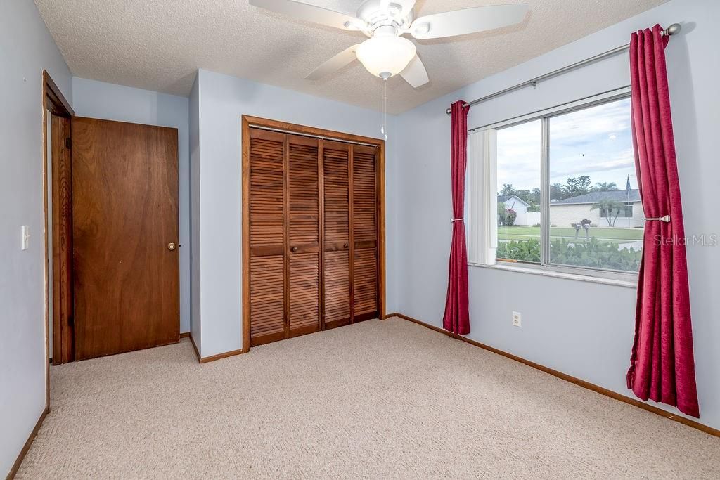 2nd bedroom new ceiling fan w light fixture