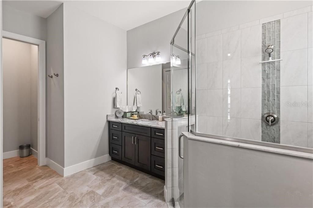 Master bathroom with private toilet room and lots of storage!