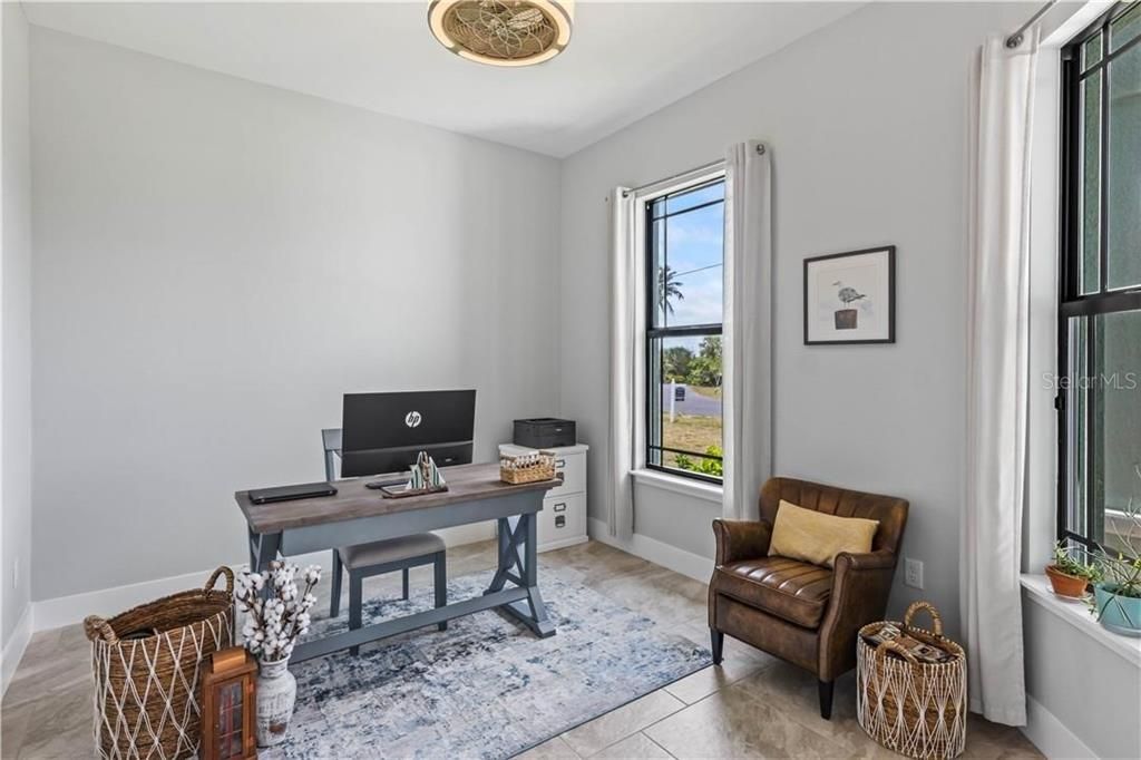 In the front of this home is a bright and airy office so you could work from home.