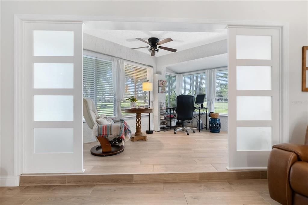 ENTRY TO SUNROOM FRAMED WITH CUSTOM SIDELIGHTS