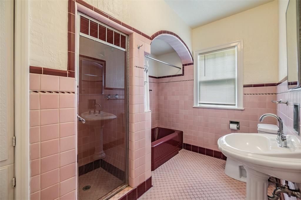 Beautifully maintained 1920's bathroom, seperate shower stall