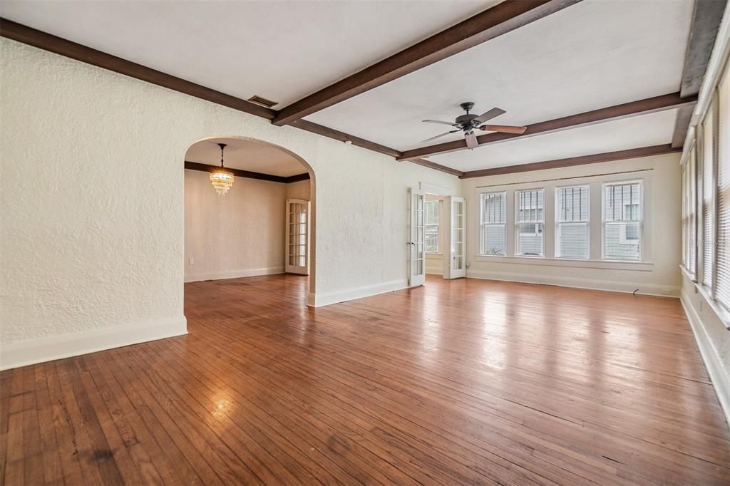 Living room with character and charm! Look at those ceilings  and arches!