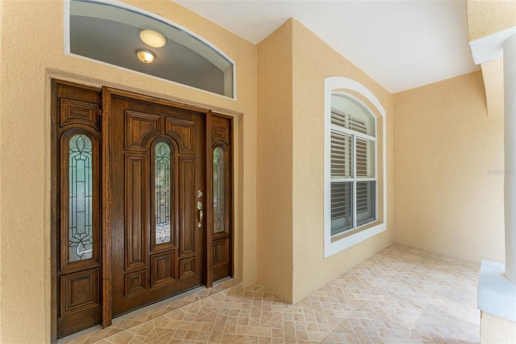 Covered Front Entry Porch with Tile Flooring