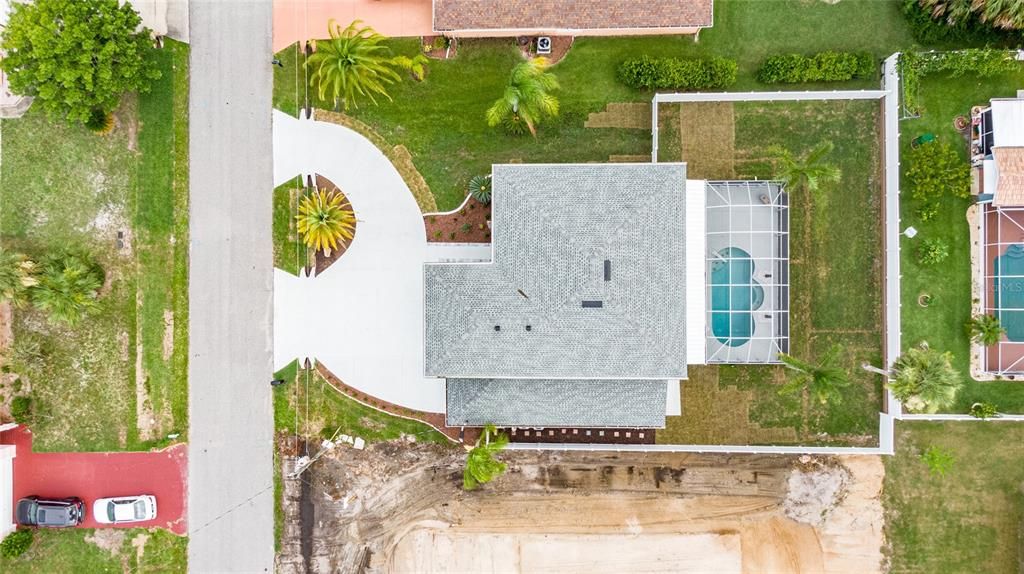 Birds eye view of the home with private fenced yard and amazing circular driveway